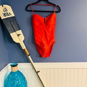 One piece fashion bathing suit.